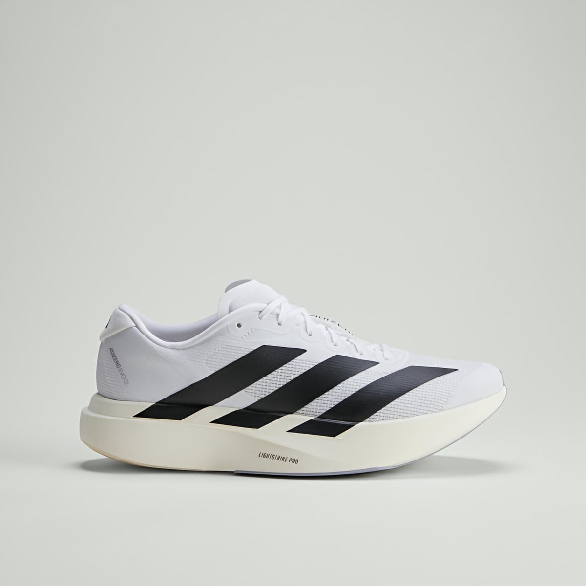J010-ADIZERO EVOSL White EXTRA SOFT MEDICATED LIGHTWEIGHT SHOES.